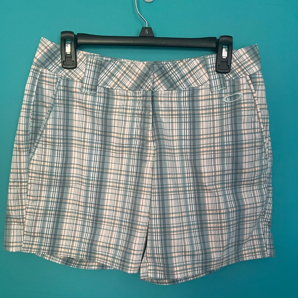 Oakley women’s multicolored striped shorts. Women’s Sz 8. Waist is 30”.